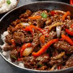 Crispy Beef Stir-Fry with Peppers and Onions